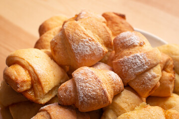 Bowl of homemade croissant cookies. Baking at home