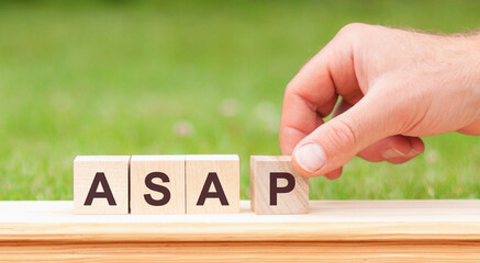 Word Asap written with wooden blocks, concept