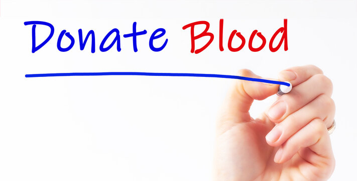 Hand writing inscription Donate Blood with marker, concept, stock image