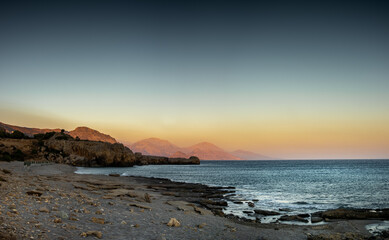 View of empty beach at dusk