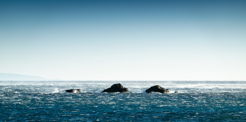 Stones surrounded by sea water
