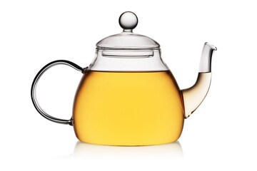 Glass teapot with green tea isolated in white.
