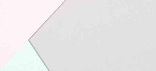 Abstract colored paper background. Minimal geometric shapes and lines in pastel pink, light green and gray colours