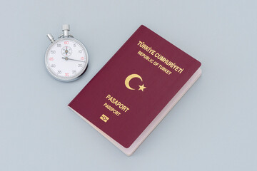Turkish citizen public passport on th gray background.
