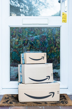 Amazon Prime Parcel Carboard Boxes Left In Front Of The Main Door Outside