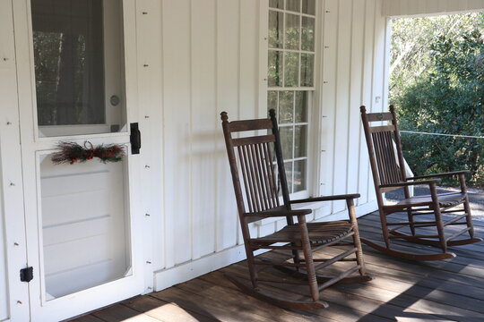 Rocking Chairs On Farm House Porch