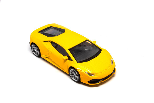 A Super Yellow Car Isolated On A White Background