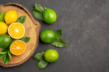 top view fresh lemons on dark desk lime sour fruit citrus