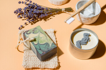 Top view of different hygiene and care items on cream color background, zero waste concept.