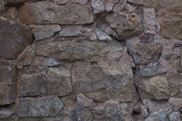 background of stone. in the photo, the stone wall of the old building