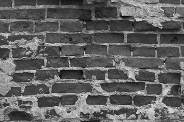 gray brick background. in the photo, the brick wall of the old building