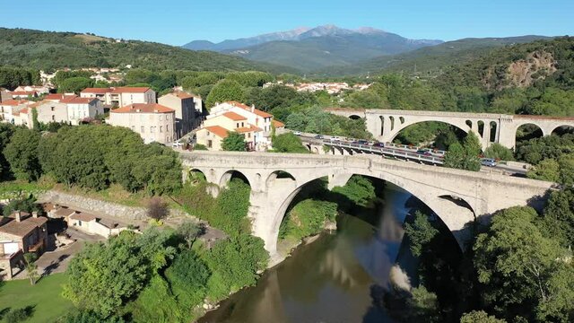 Flight over the city Ceret on summer day. France 