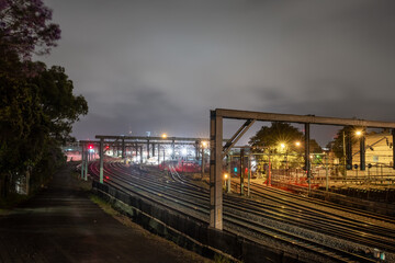 Fototapeta premium night time railway tracks and clouds