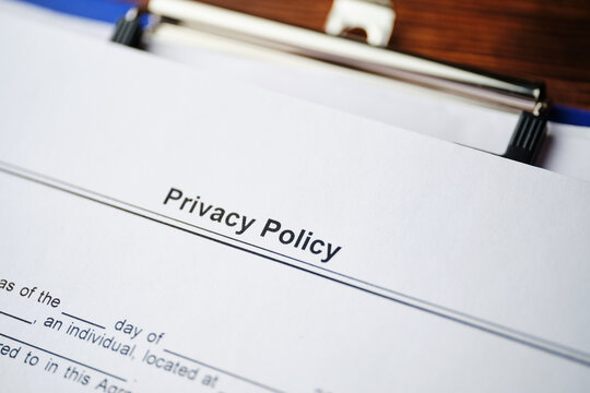 Legal Document Privacy Policy On Paper Close Up.