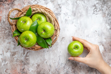 top view sliced green apples inside basket on light background mellow fresh photo ripe