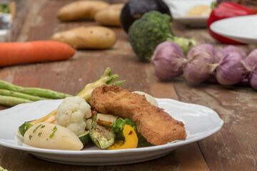Mixed seasonal vegetable plate with parsley potatoes