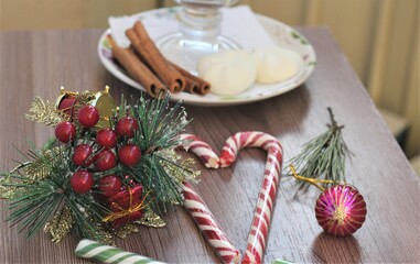 christmas decoration on table with candy and ball