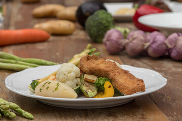 Mixed seasonal vegetable plate with parsley potatoes
