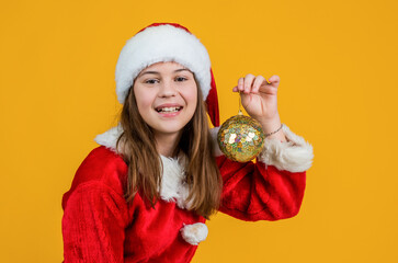 happy xmas girl kid wear red santa claus hat and costume hold tree decoration, decor