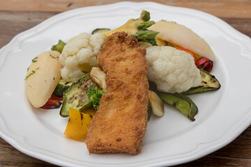 Mixed seasonal vegetable plate with parsley potatoes