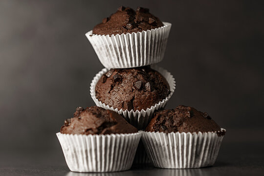 Chocolate Muffins on black background