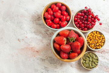 top view fresh red strawberries with other fruits on white background fruit berry trees