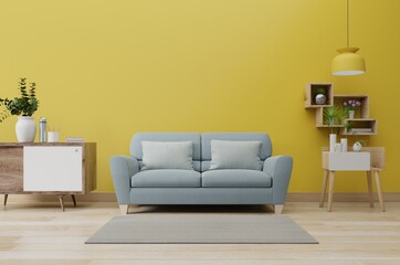 Modern living room interior with sofa and green plants,lamp,table on yellow illuminating wall background.