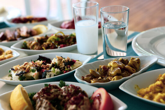 Turkish and Greek Traditional Dinning Table with Special Alcohol Drink Raki. Ouzo and Turkish Raki is a dry anise flavoured aperitif that is widely consumed in Turkey, Greece, Cyprus and Lebanon