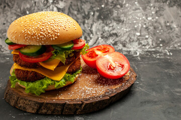 front view meat burger with vegetables and cheese on dark background sandwich bun fast-food