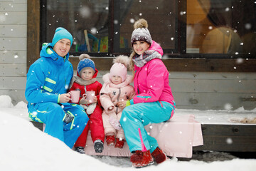 Family on the porch in winter