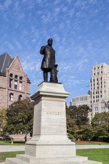 Obraz premium TORONTO, CANADA - OCTOBER 22, 2017: Sir James Whitney Statue in Queen's Park, Toronto, Canada. Created by Hamilton MacCarthy, the statue was unveiled in 1927.