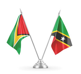 Saint Kitts and Nevis and Guyana table flags isolated on white 3D rendering