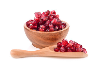 Fruit pomegranate in wood bowl on white background