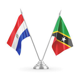 Saint Kitts and Nevis and Paraguay table flags isolated on white 3D rendering