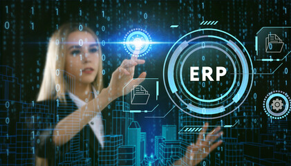 Business, Technology, Internet and network concept. Young businessman working on a virtual screen of the future and sees the inscription: ERP