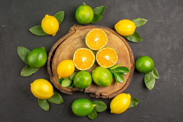 top view fresh sour lemons on a dark background lime tree citrus fruit
