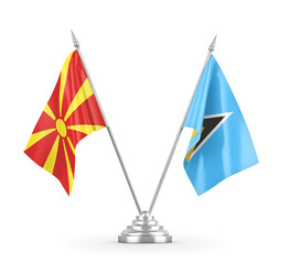 Saint Lucia and North Macedonia table flags isolated on white 3D rendering