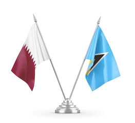 Saint Lucia and Qatar table flags isolated on white 3D rendering