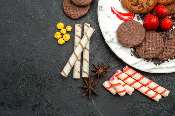 top view yummy choco biscuits for tea on a dark background tea sweet cookie sugar