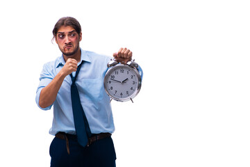 Unhappy young male employee in time management concept