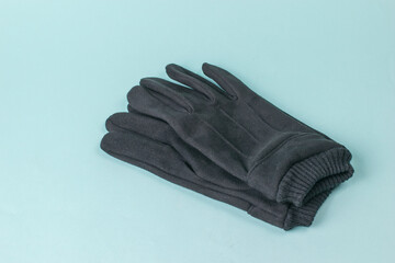 brutal men's leather gloves on a blue background.