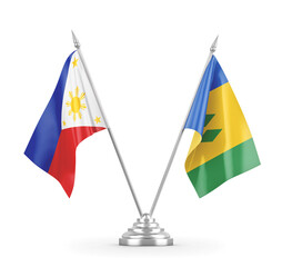 Saint Vincent and the Grenadines and Philippines table flags isolated