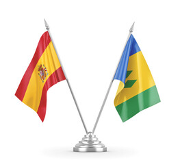 Saint Vincent and the Grenadines and Spain table flags isolated