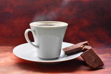 Full to the brim white coffee cup on white porcelain saucer strong black invigorating coffee with...