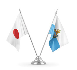 San Marino and Japan table flags isolated on white 3D rendering