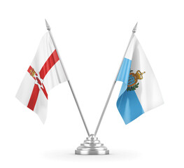 San Marino and Northern Ireland table flags isolated on white 3D rendering