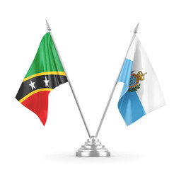 San Marino and Saint Kitts and Nevis table flags isolated on white 3D rendering