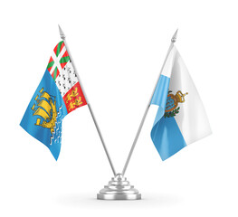 San Marino and Saint Pierre and Miquelon table flags isolated on white