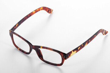 A close-up picture of a hawksbill turtle glasses frame on a white background