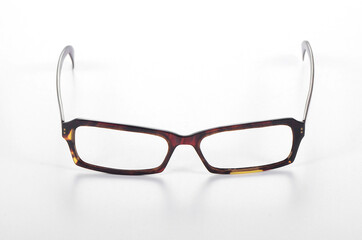 A close-up picture of a hawksbill turtle glasses frame on a white background